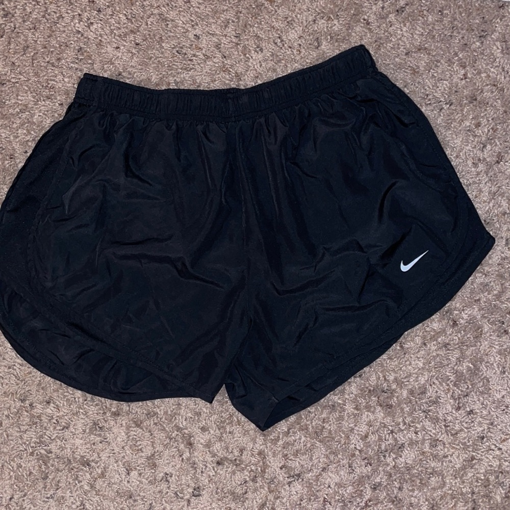 Black Nike running shorts